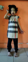 Rosy is standing during lesson in class