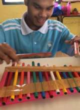 Daniel is playing xylophone