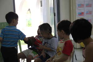 A puppet can encourage the children to interact.
