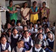 staff and children in classroom