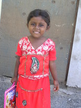 Slum girl attending to school at Ramarajunagar