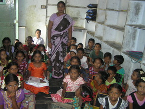 classroom in a slum at Swarnabharathinagar, Guntur