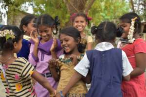 happy to be in school in remote slum