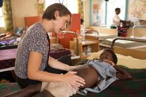 Dr Trijn Israels from Amsterdam with a patient