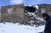 Seismic Performance Improvement of Masonry Houses