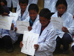 Little Doctors receiving their certificates.