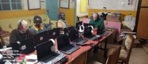 Students using the laptops and headsets