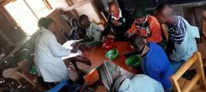 Students using the horseshoe tables