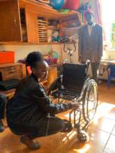 DCC staff assembling the wheelchairs