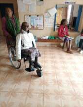 A recipient of one of the new wheelchairs.