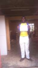 Frederick with his Grade 3 Carpentry certificate