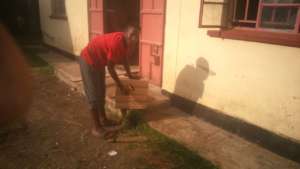 Kennedy varnishing the lockers