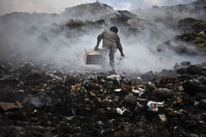 Boy in Garbage Dump