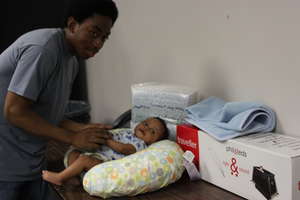 Father and Baby with More Baby Buggy Gifts