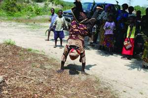 Mercy doing a somersault