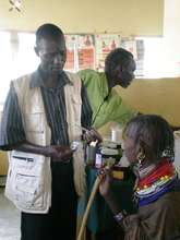 A Merlin health worker and patient,Turkana