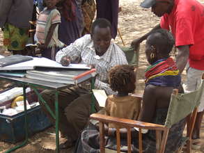 A mom bringing her daughter to our outreach clinic