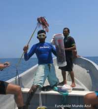 Community member showing off his catch