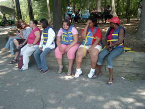 Campers wait for their turn on a boat ride.
