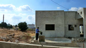 Nabil's father comes to show us water from cistern