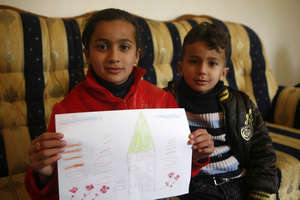 Shahad and Shady play at their new home every day