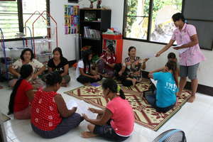 Group facilitator with WEDA women