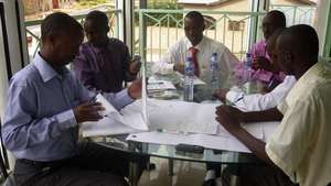 group of lawyers discussing juvenile justice