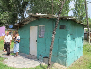 The metal shacks where many families still live