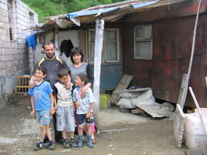 Avetikyan family in front of their "shelter"