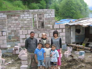 Avetiklyan family in front of their future home