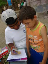 the family child with a volunteer
