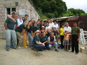 volunteer team from Mercer University with family