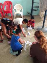 Kids playing games as they wait to see the doctor