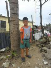 Boy eagerly awaiting a child sponsor