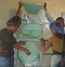 PATHWAYS scholars inspecting the mill with Michael