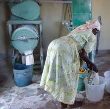 Martha Njoki at the mill grinding her cassava