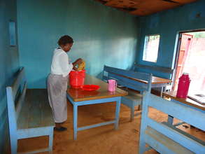 Mrs. Wanjiku in her restaurant
