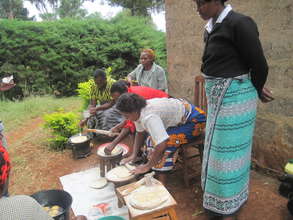 Women preparing cassava dishes
