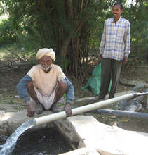 Deepak (left) Demonstrating The Well At Kundai