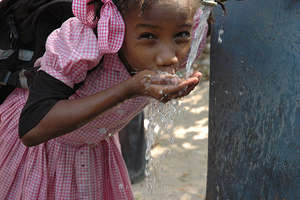 School girl drinking clean water