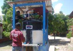 The new chlorinator, water tank, and water pump at