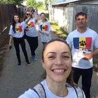 RAR vets and techs walk throughout the village