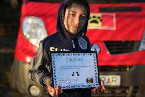 one of our star volunteers gets his diploma