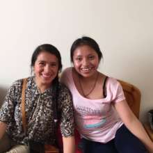 Rosa (left) and Gloria in their apartment in Lima.