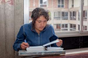 Maria working on math homework.