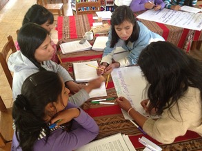 A group of girls plan their community project.