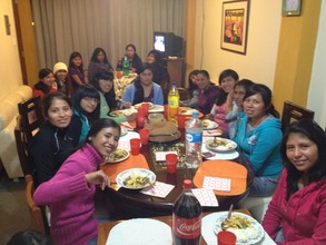 Girls in Peruvian Promise gather for dinner.