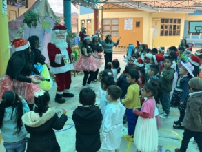 PH scholars led the school children in a dance.