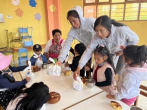 PH scholars help out during the service project.