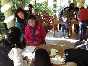 Participants begin registration for the conference